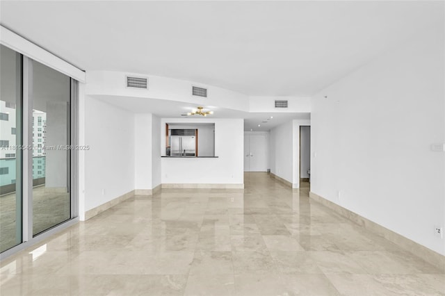 1331 Brickell Bay Dr Unit 1808, Miami, FL 33131 - unfurnished room featuring light marble finish floors and baseboards