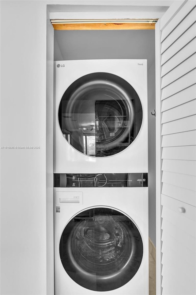 1331 Brickell Bay Dr Unit 1808, Miami, FL 33131 - laundry area with stacked washer and clothes dryer