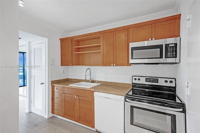 9800 W Bay Harbor Dr Unit 401, Bay Harbor Islands, FL 33154 - kitchen featuring stainless steel appliances, a sink, open shelves, decorative backsplash, and crown molding