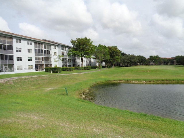 900 SW 125th Way Unit 112R, Pembroke Pines, FL 33027 - view of community featuring a water view and a lawn