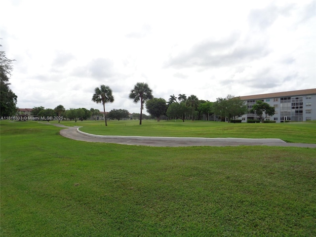 900 SW 125th Way Unit 112R, Pembroke Pines, FL 33027 - surrounding community featuring a lawn