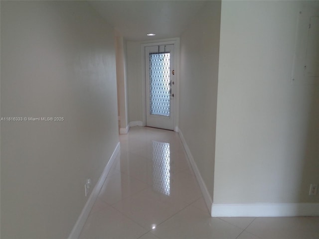900 SW 125th Way Unit 112R, Pembroke Pines, FL 33027 - corridor with light tile patterned floors and baseboards