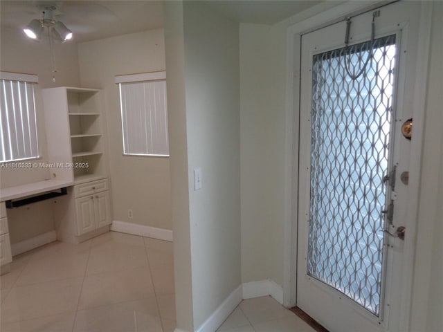 900 SW 125th Way Unit 112R, Pembroke Pines, FL 33027 - entrance foyer with ceiling fan, light tile patterned flooring, and baseboards