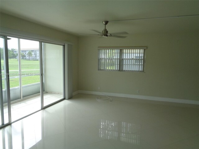 900 SW 125th Way Unit 112R, Pembroke Pines, FL 33027 - tiled spare room with ceiling fan and baseboards