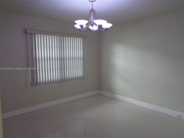 900 SW 125th Way Unit 112R, Pembroke Pines, FL 33027 - spare room featuring a chandelier, baseboards, and tile patterned floors