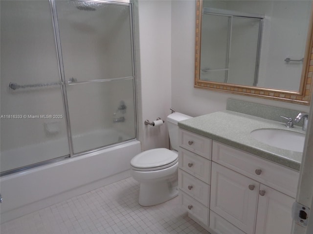 900 SW 125th Way Unit 112R, Pembroke Pines, FL 33027 - bathroom with vanity, toilet, bath / shower combo with glass door, and tile patterned floors