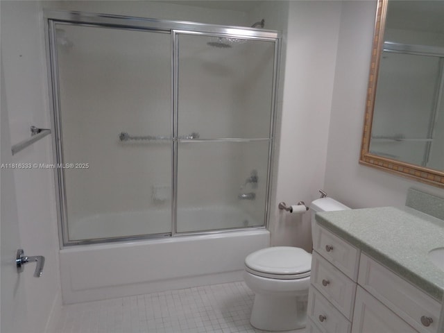 900 SW 125th Way Unit 112R, Pembroke Pines, FL 33027 - bathroom with vanity, toilet, bath / shower combo with glass door, and tile patterned floors