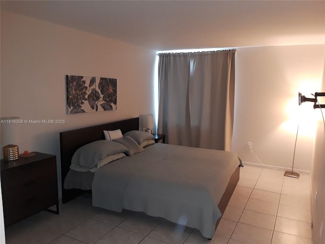 250 180th Dr Unit 159, Sunny Isles Beach, FL 33160 - bedroom with light tile patterned flooring