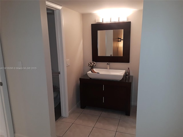250 180th Dr Unit 159, Sunny Isles Beach, FL 33160 - bathroom with vanity and tile patterned flooring