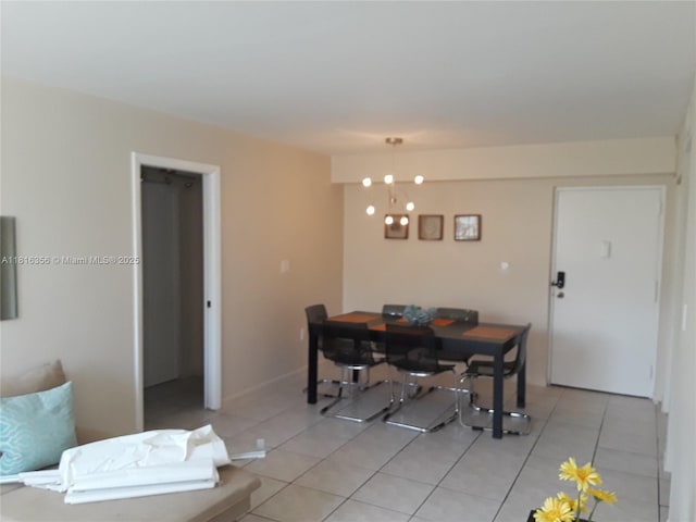 250 180th Dr Unit 159, Sunny Isles Beach, FL 33160 - dining room featuring light tile patterned floors and a chandelier
