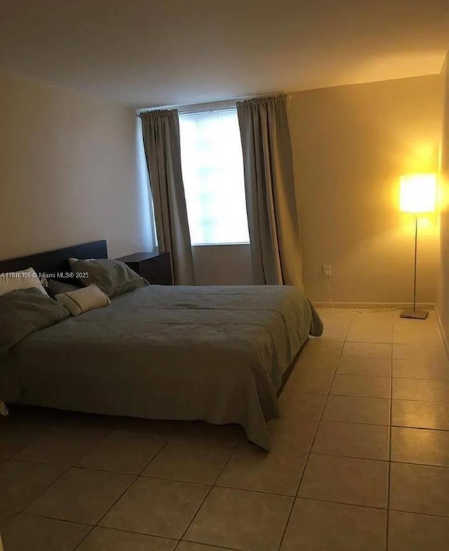 250 180th Dr Unit 159, Sunny Isles Beach, FL 33160 - bedroom featuring light tile patterned floors