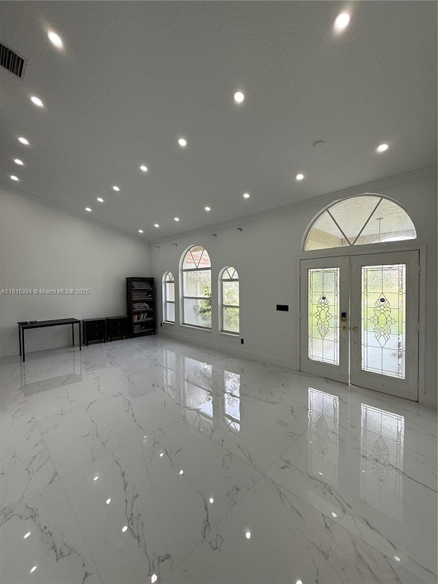 17084 N 33rd Rd N, Loxahatchee, FL 33470 - spare room featuring french doors, recessed lighting, marble tiled flooring, and ornamental molding