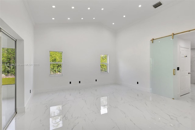 17084 N 33rd Rd N, Loxahatchee, FL 33470 - empty room with a high ceiling, baseboards, recessed lighting, and marble tiled floors