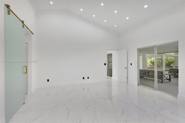 17084 N 33rd Rd N, Loxahatchee, FL 33470 - unfurnished room featuring a towering ceiling, baseboards, recessed lighting, crown molding, and marble finish floors