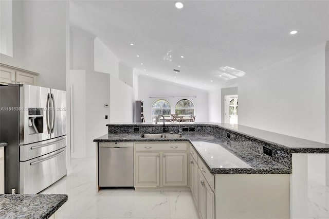 17084 N 33rd Rd N, Loxahatchee, FL 33470 - kitchen with stainless steel appliances, light marble finish floors, a sink, vaulted ceiling, and recessed lighting