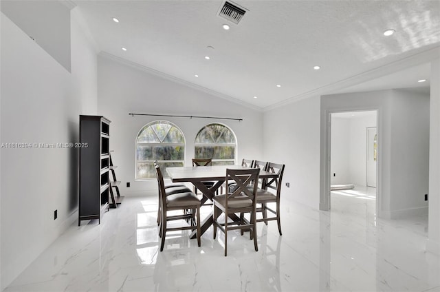 17084 N 33rd Rd N, Loxahatchee, FL 33470 - dining space with ornamental molding, vaulted ceiling, light marble finish flooring, and recessed lighting