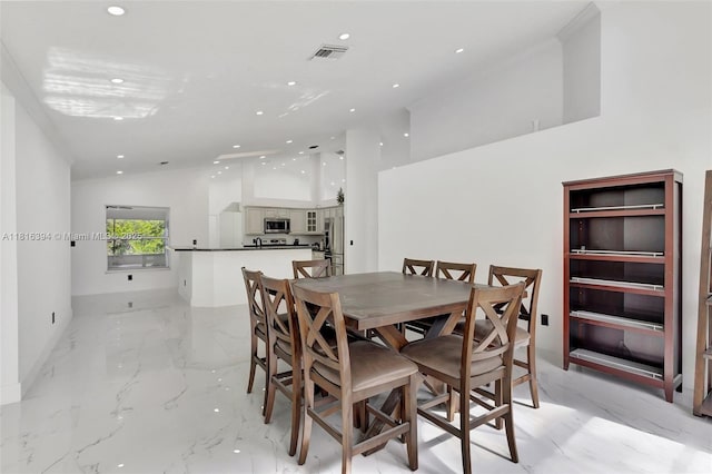 17084 N 33rd Rd N, Loxahatchee, FL 33470 - dining room featuring recessed lighting and light marble finish floors