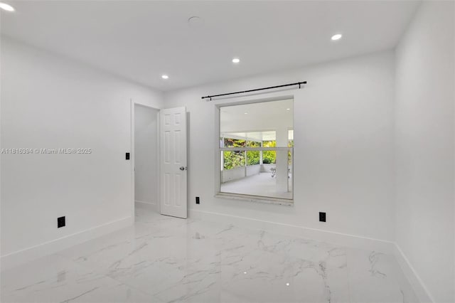 17084 N 33rd Rd N, Loxahatchee, FL 33470 - unfurnished room with baseboards, recessed lighting, and marble finish floors