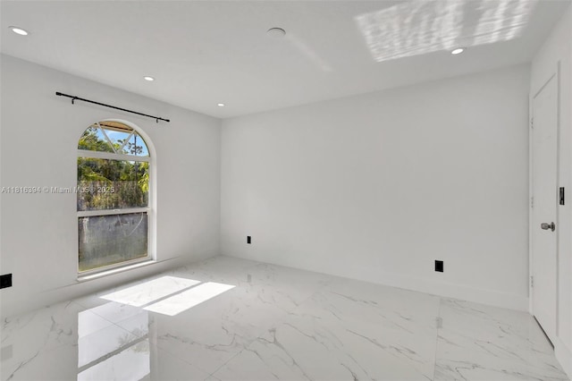 17084 N 33rd Rd N, Loxahatchee, FL 33470 - spare room featuring marble finish floors and recessed lighting