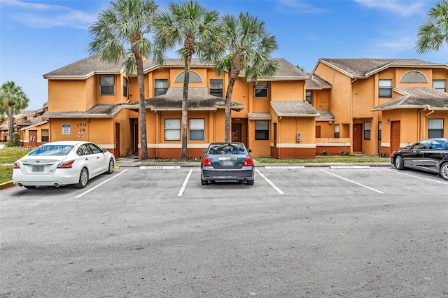 2541 NW 56th Ave Unit 3-19, Lauderhill, FL 33313 - view of building exterior with uncovered parking