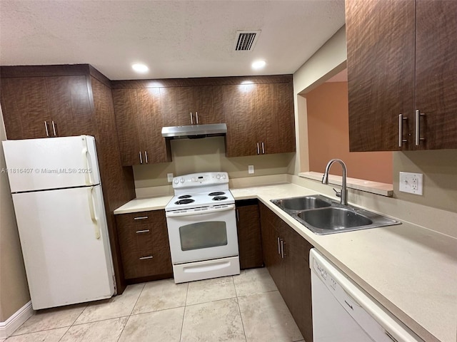 2541 NW 56th Ave Unit 3-19, Lauderhill, FL 33313 - kitchen with white appliances, under cabinet range hood, a sink, dark brown cabinetry, and light countertops