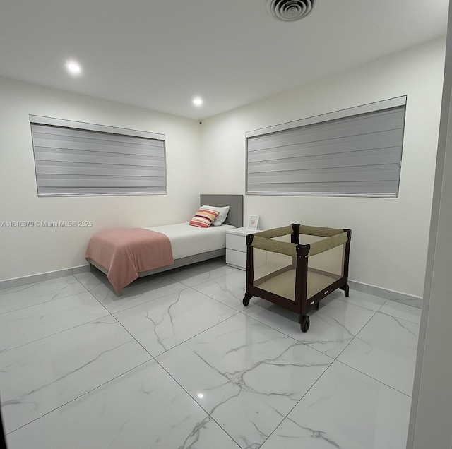 17630 NE 4th Ave, North Miami Beach, FL 33162 - bedroom featuring light marble finish flooring and recessed lighting