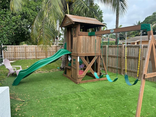 17630 NE 4th Ave, North Miami Beach, FL 33162 - view of playground with a fenced backyard