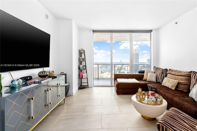 1800 S Ocean Dr Unit 2208, Hallandale Beach, FL 33009 - living room featuring expansive windows, light tile patterned floors, and a city view