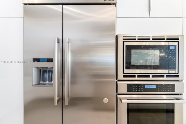 1800 S Ocean Dr Unit 2208, Hallandale Beach, FL 33009 - kitchen featuring appliances with stainless steel finishes and white cabinets