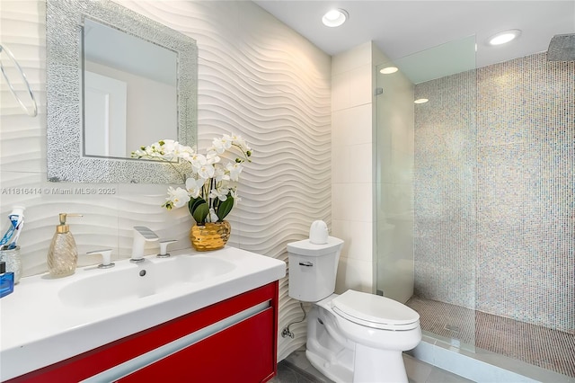 1800 S Ocean Dr Unit 2208, Hallandale Beach, FL 33009 - full bath with toilet, a stall shower, vanity, recessed lighting, and tile walls