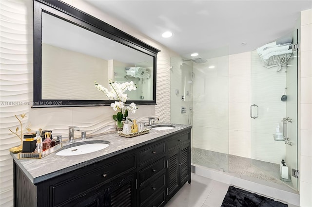 1800 S Ocean Dr Unit 2208, Hallandale Beach, FL 33009 - bathroom featuring a stall shower, double vanity, and tile patterned flooring