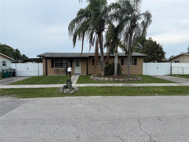 14511 SW 294th St, Homestead, FL 33033 - ranch-style home with a gate and stucco siding