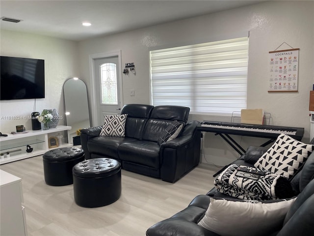 14511 SW 294th St, Homestead, FL 33033 - living area with light wood-type flooring and a textured wall
