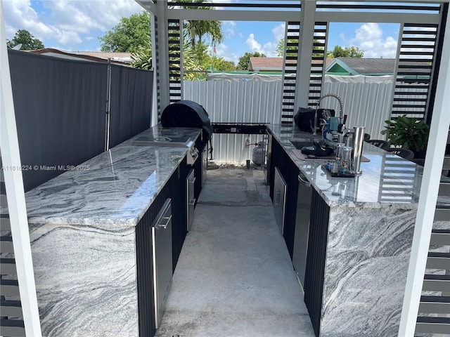 14511 SW 294th St, Homestead, FL 33033 - view of patio / terrace with exterior kitchen and a sink