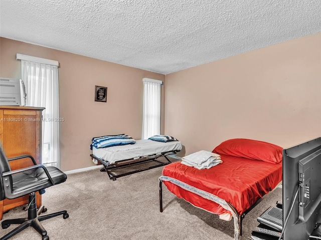 3121 N 52nd Ave, Hollywood, FL 33021 - carpeted bedroom with a textured ceiling, an office area, and baseboards