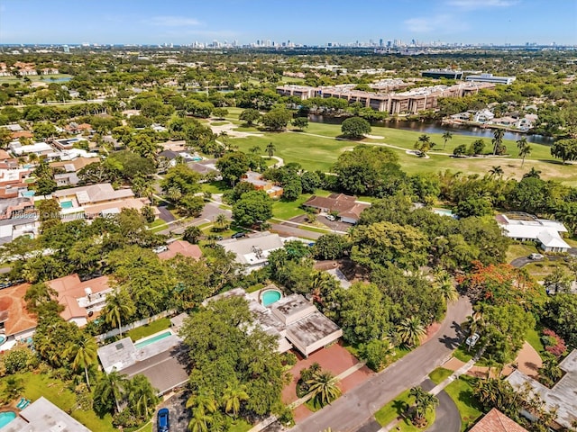 3121 N 52nd Ave, Hollywood, FL 33021 - aerial perspective of suburban area with a golf club, a nearby body of water, and city skyline