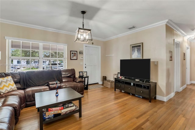 1110 Falcon Ave, Miami Springs, FL 33166 - living room with light wood-style flooring, ornamental molding, a chandelier, and baseboards