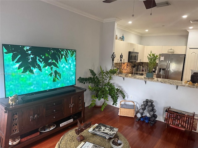 973 SW 149th Ct, Miami, FL 33194 - living room with ceiling fan, wood finished floors, baseboards, ornamental molding, and recessed lighting