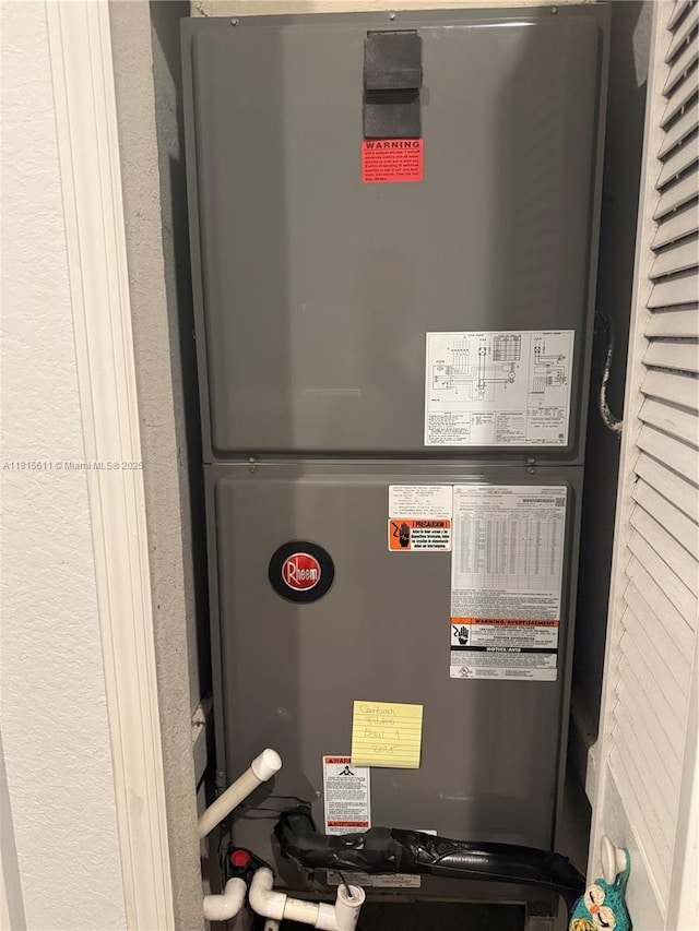 973 SW 149th Ct, Miami, FL 33194 - utility room with heating unit