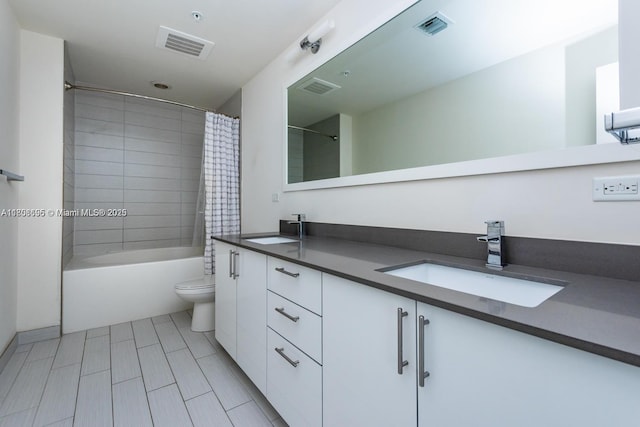 999 1st Ave Unit 2707, Miami, FL 33130 - full bathroom featuring double vanity, shower / bath combination with curtain, and toilet