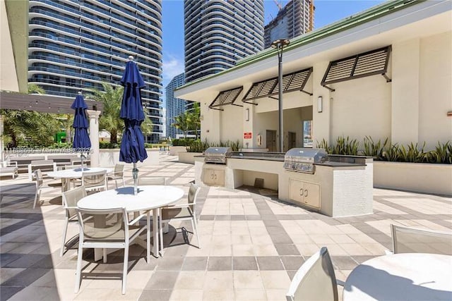 999 1st Ave Unit 2707, Miami, FL 33130 - view of patio featuring outdoor dining area