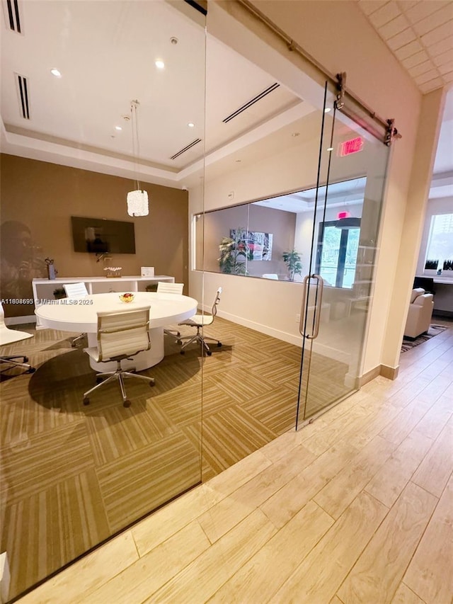 999 1st Ave Unit 2707, Miami, FL 33130 - office with a raised ceiling, baseboards, recessed lighting, and wood finished floors