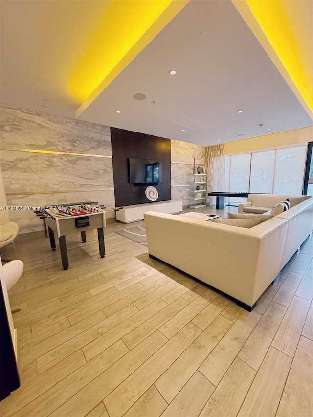 999 1st Ave Unit 2707, Miami, FL 33130 - living room featuring light wood finished floors, recessed lighting, and wallpapered walls