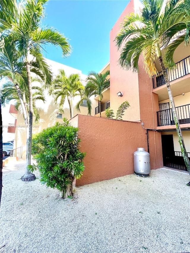 677 SW 9th Ave Unit 309, Miami, FL 33130 - view of side of home featuring stucco siding