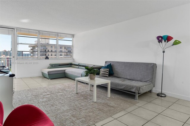 251 174th St Unit 2115, Sunny Isles Beach, FL 33160 - tiled living room with baseboards and a city view