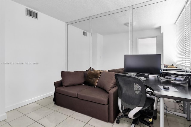 251 174th St Unit 2115, Sunny Isles Beach, FL 33160 - office featuring a textured ceiling and light tile patterned floors
