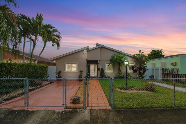 6710 SW 33rd St, Miami, FL 33155 - mid-century home with a gate and stucco siding