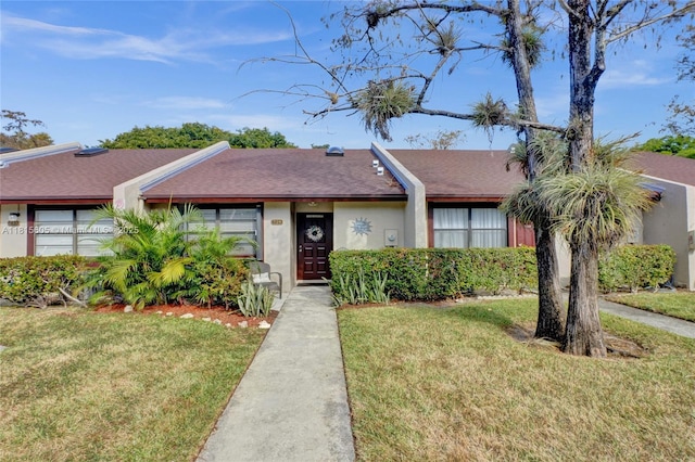 729 NW 47th St, Deerfield Beach, FL 33064 - multi unit property featuring a front yard, roof with shingles, and stucco siding