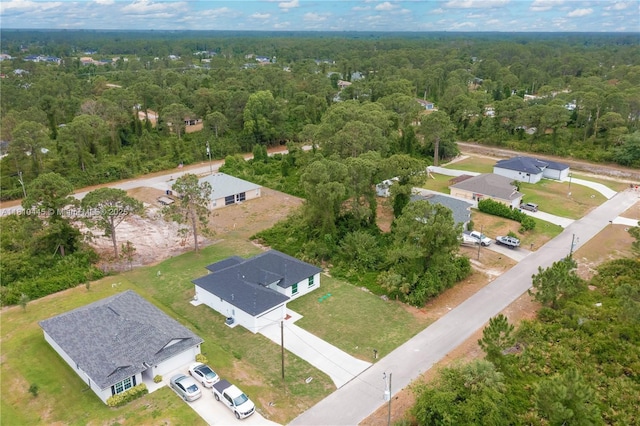 3121 71st St W, Lehigh Acres, FL 33971 - aerial perspective of suburban area featuring a forest