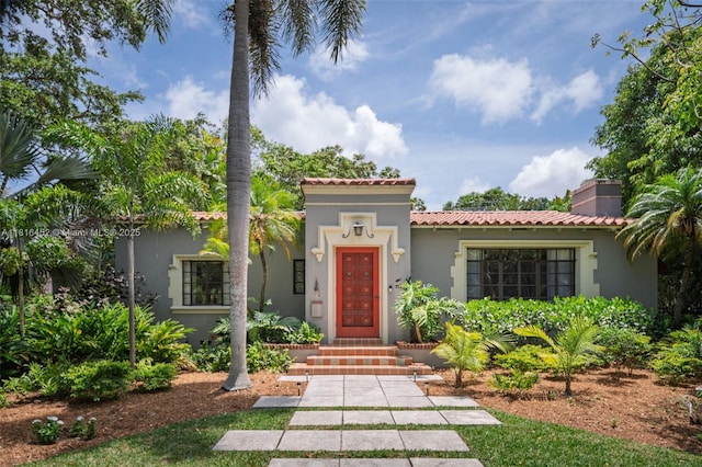 492 NE 55th St, Miami, FL 33137 - mediterranean / spanish-style house featuring stucco siding and a tile roof